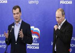 putin s party barely hangs on to its majority