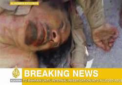 gaddafi s body was kicked around on streets of sirte died inside a sewer