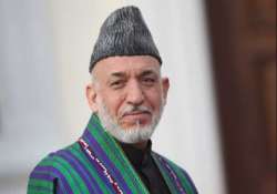 hamid karzai casts vote in presidential runoff polls