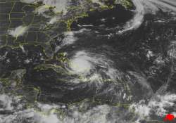 hurricane irene lashes bahamas and aims at us coast