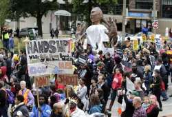 thousands protest police shootings in st. louis