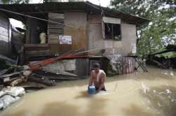 typhoon hits southern china heads to vietnam