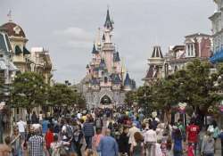 man with 2 handguns partner arrested at disneyland paris