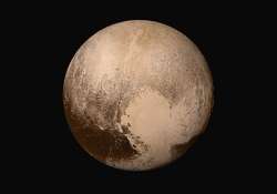 new horizons discovers flowing ice vast haze on pluto