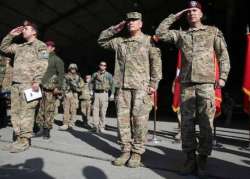 us nato ceremonially end afghan combat mission