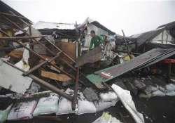 storm exits sparing philippines of huge losses