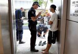 men detained outside obama s hotel in brisbane