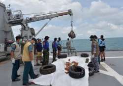 airasia crash search personnel lift plane s tail