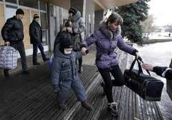 civilians flee east ukraine town as fighting intensifies