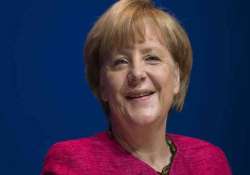 merkel to join islamic rally for tolerance