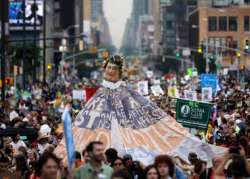 thousands join worldwide climate change march in new york