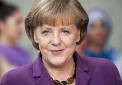 angela merkel thanks germans for helping 1 million refugees