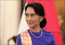 myanmar s opposition leader aung san suu kyi registers for polls