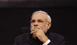 usd 10 000 reward for serving summons to narendra modi