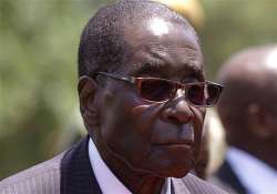 robert mugabe fires vice president seven cabinet ministers