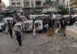 suicide bombing at shiite procession kills 20 in pakistan