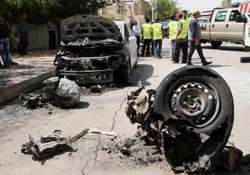 two separate car bombs in parking lots kill 10