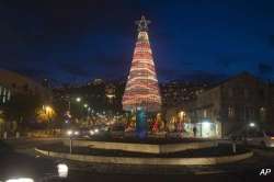 plastic bottle xmas tree goes up amid tree shortage in israel