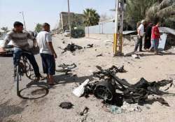 bombings kill 19 people in and around baghdad