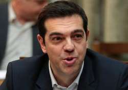 greek pm defends choice of harsh debt deal