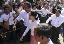 myanmar s suu kyi wins seat requests meeting with military