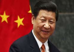 president xi jinping unveils new slogan to govern china