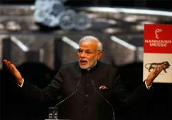 pm modi woos investors in germany promises predictable tax regime in india