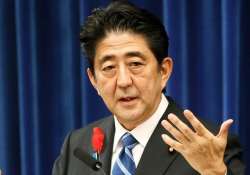 japan pm shinzo abe calls latest hostage deadline despicable