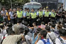 hk democracy activists defy police in standoff