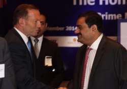 australian pm tony abbott under attack for pro adani statement