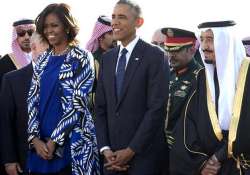 michelle obama without headscarf stokes controversy in saudi arabia