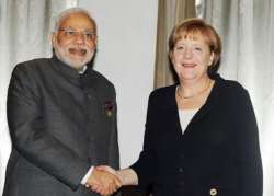 will look into german language row modi assures merkel