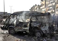 syrian tv two blasts in the city of homs 32 killed 29 wounded