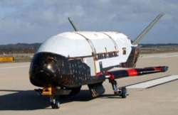 secret us spacecraft returns after 7 month trip