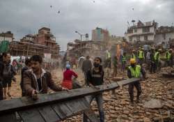 nepaldevastated earthquake leaves over 3300 dead rain hinders rescue efforts