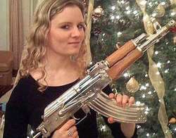 girl with the golden gun british spy chief s daughter posts facebook pic with saddam s rifle