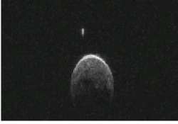 asteroid that flew past earth has small moon