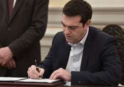 greek government suffers defections as austerity vote looms