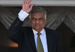 ranil wickremesinghe vows to work with rivals to build unity government