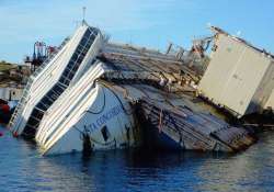 italy s sunken ship towed away