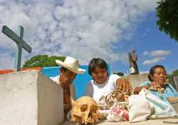 know about the cemetery in mexico where bones of the dead are taken out for cleaning