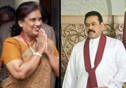 kumaratunga asks rajapaksa to share power with tamils