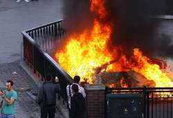 anarchy loot vandalism spreads to manchester birmingham uneasy quiet in london