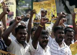 malaysia charges 11 indians after race protests