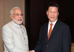 narendra modi meets xi jinping wants to solve border row seeks investment