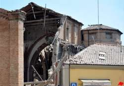 italian woman rescued from rubble 12 hours after killer quake struck