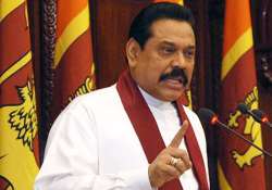 no one has to tell us what to do says rajapaksa