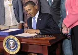 obama signs violence against women act