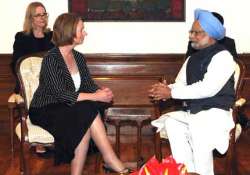 pm discusses uranium sale with gillard