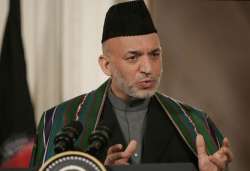 pak should be happy afghan is being helped by india karzai